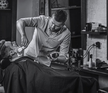 barber shaving client