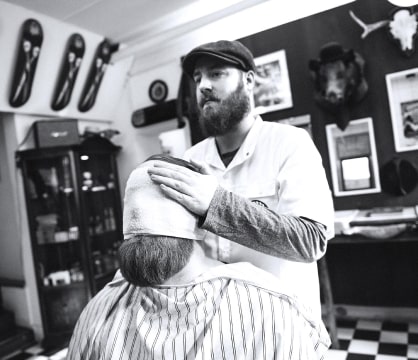 barber shaving client